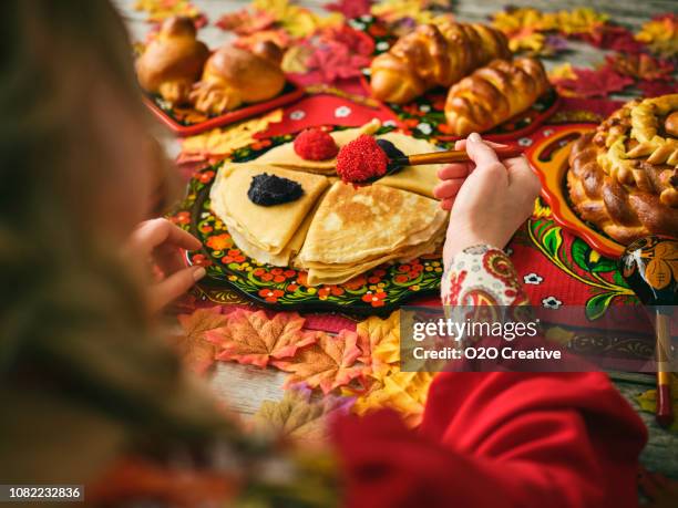russian traditional blini and caviar on a table - blini stock pictures, royalty-free photos & images