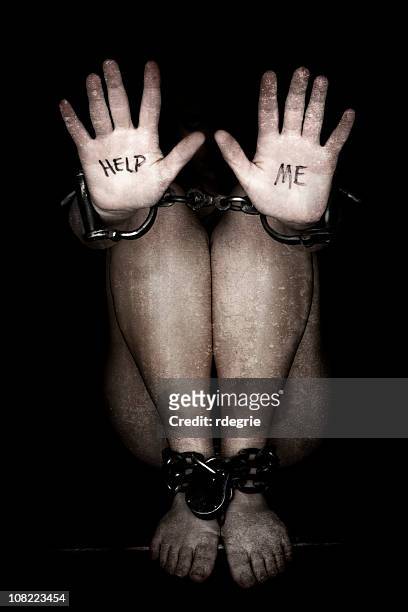 slavery - human trafficking - woman stuck stock pictures, royalty-free photos & images