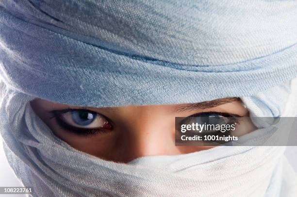 young woman with blue eyes wearing headscarf - tuareg bildbanksfoton och bilder