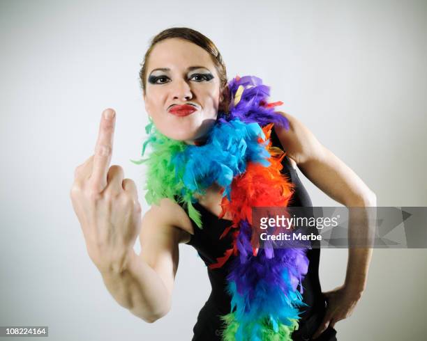woman giving rude gesture - women in suspenders 個照片及圖片檔