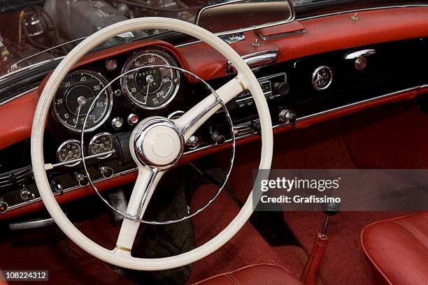 dashboard and steering wheel of collectors car - sports car dashboard stock pictures, royalty-free photos & images
