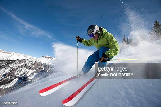 skier close up in action - professional skier stock pictures, royalty-free photos & images