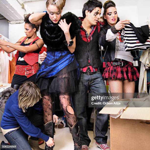 models changing clothing backstage - woman backstage stock pictures, royalty-free photos & images