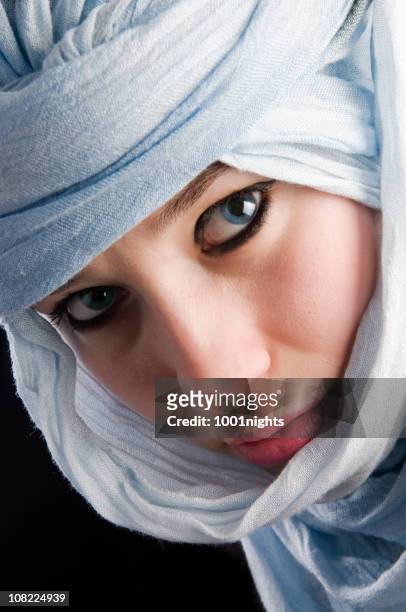headshot of young woman with blue eyes wearing headscarf - blue eyed soul stock pictures, royalty-free photos & images