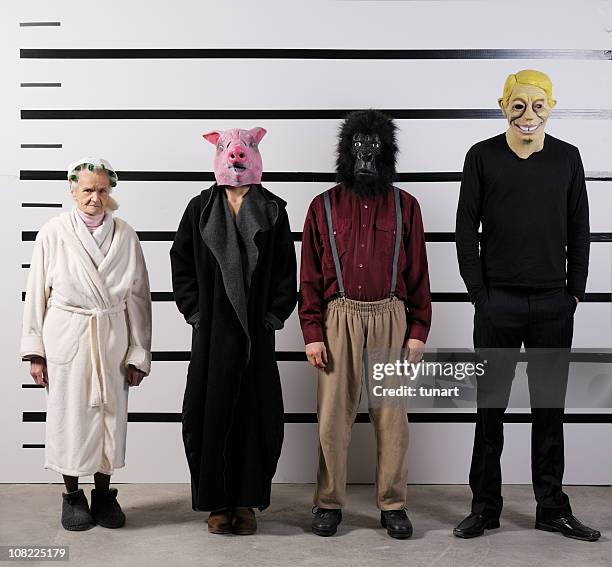 gang members - female gangster costume stock pictures, royalty-free photos & images
