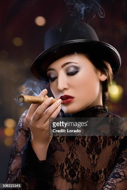 young woman smoking cigar - beautiful women smoking cigars 個照片及圖片檔