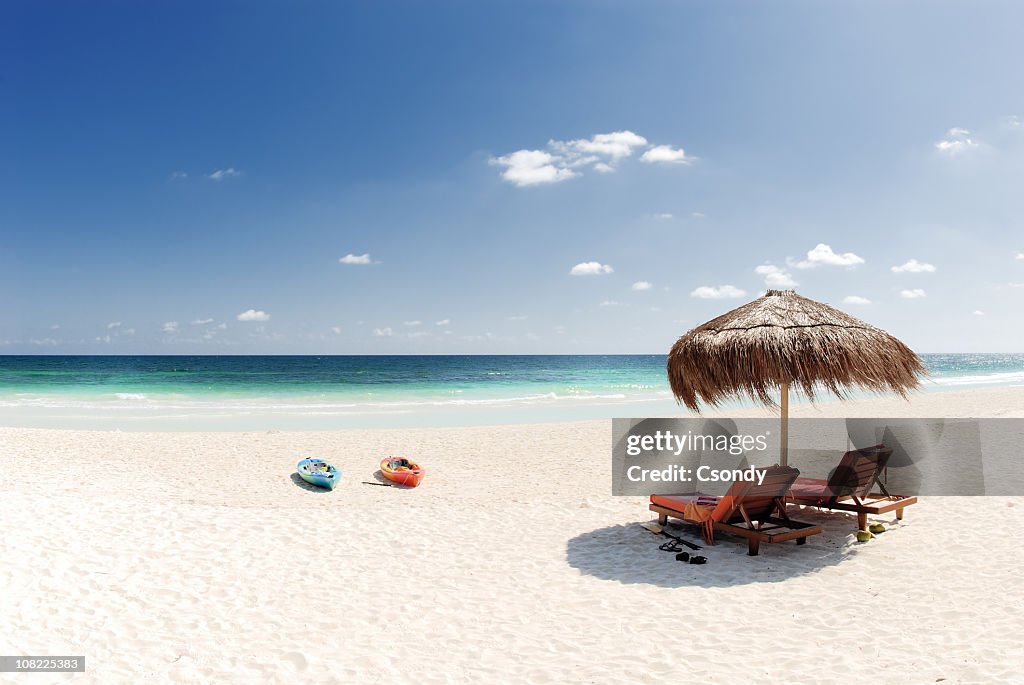 Beach with white sand and blue water