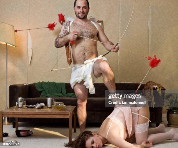 cupid and woman - mancave stockfoto's en -beelden