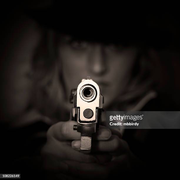 agent in dark - female gangster stock pictures, royalty-free photos & images