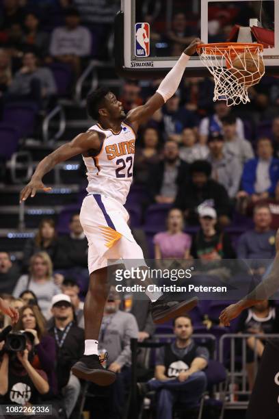 Deandre Ayton of the Phoenix Suns slam dunks the ball against the Dallas Mavericks during the first half of the NBA game at Talking Stick Resort...