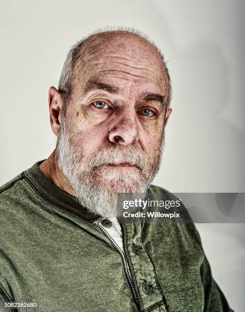 weary senior adult man portrait - beard care stock pictures, royalty-free photos & images