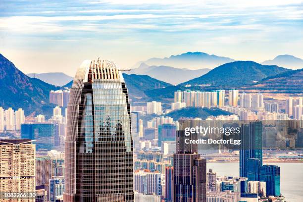 international financial center building with hong kong cityscape from victoria peak, hong kong - tour two international finance center photos et images de collection