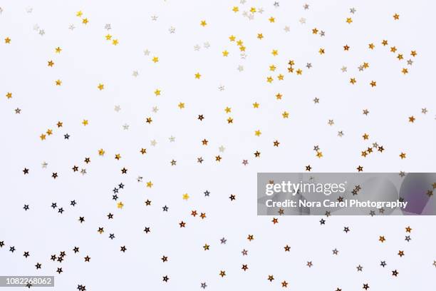 new year and christmas background - confetti white background stock pictures, royalty-free photos & images