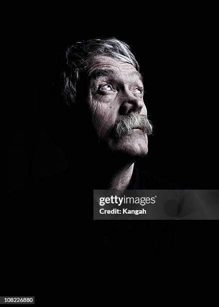 aged man-low key - dämpad belysning bildbanksfoton och bilder