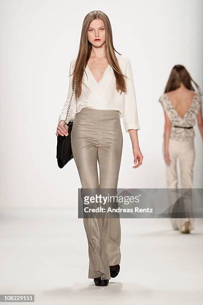Model walks the runway at the Kaviar Gauche Show during the Mercedes Benz Fashion Week Autumn/Winter 2011 at Bebelplatz on January 21, 2011 in...