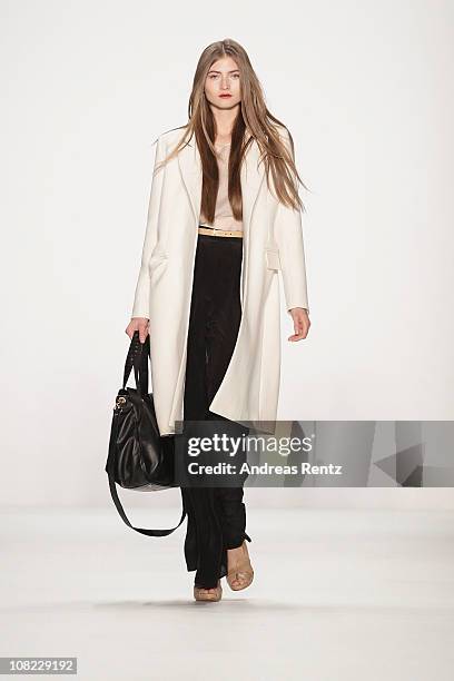 Model walks the runway at the Kaviar Gauche Show during the Mercedes Benz Fashion Week Autumn/Winter 2011 at Bebelplatz on January 21, 2011 in...