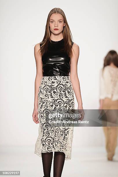 Model walks the runway at the Kaviar Gauche Show during the Mercedes Benz Fashion Week Autumn/Winter 2011 at Bebelplatz on January 21, 2011 in...