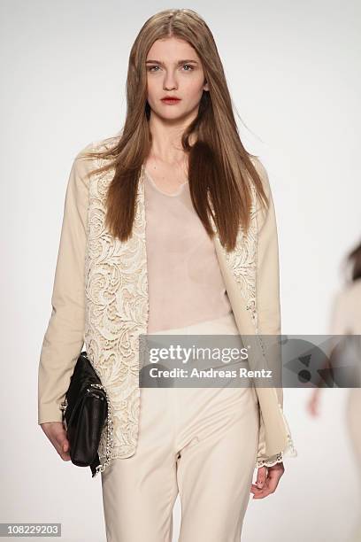 Model walks the runway at the Kaviar Gauche Show during the Mercedes Benz Fashion Week Autumn/Winter 2011 at Bebelplatz on January 21, 2011 in...