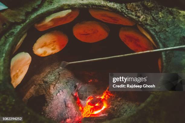 inside the tandoor - tandoor oven stock pictures, royalty-free photos & images
