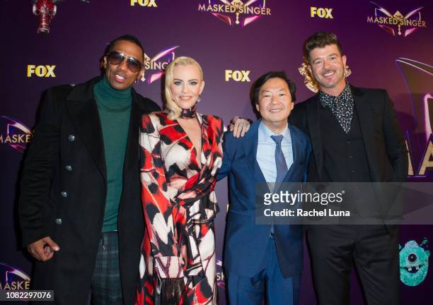 Nick Cannon, Jenny McCarthy, Ken Jeong and Robin Thicke attend Fox's 'The Masked Singer' Premiere Karaoke Event at The Peppermint Club on December...