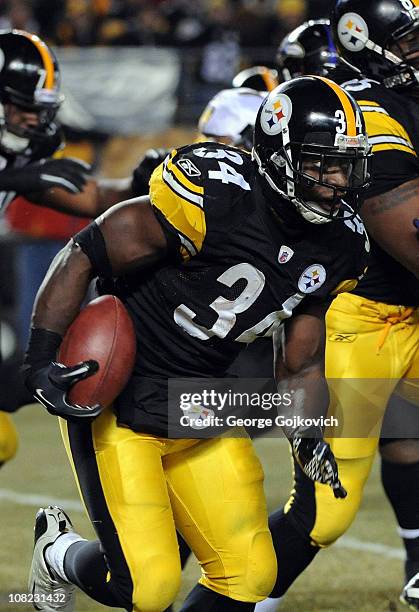 Running back Rashard Mendenhall of the Pittsburgh Steelers runs the football against the Baltimore Ravens during an AFC Divisional Playoff Game at...