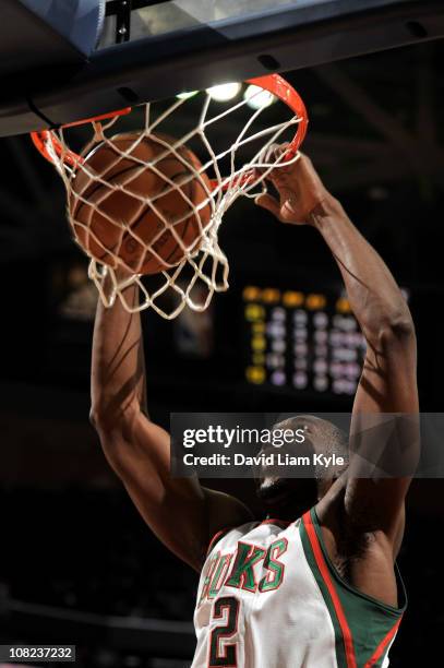 Luc Richard Mbah a Moute of the Milwaukee Bucks dunks against the Cleveland Cavaliers during the game at The Quicken Loans Arena on January 21, 2011...