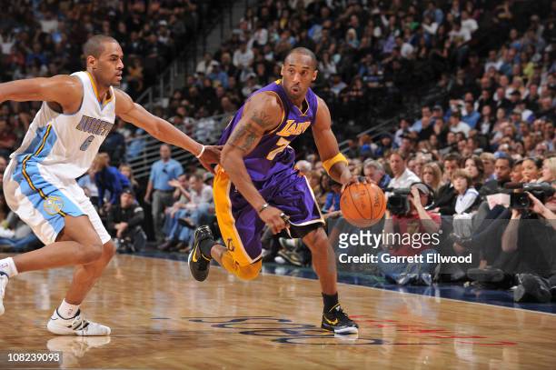 Kobe Bryant of the Los Angeles Lakers goes to the basket against Aaron Afflalo of the Denver Nuggets on January 21, 2011 at the Pepsi Center in...
