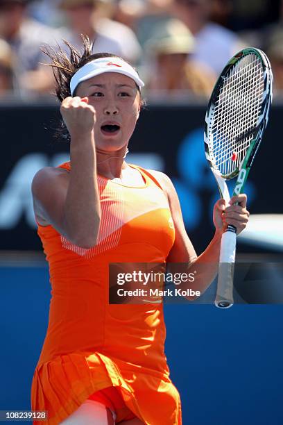 Shuai Peng of China celebrates match point in her third round match against Ayumi Morita of Japan during day six of the 2011 Australian Open at...