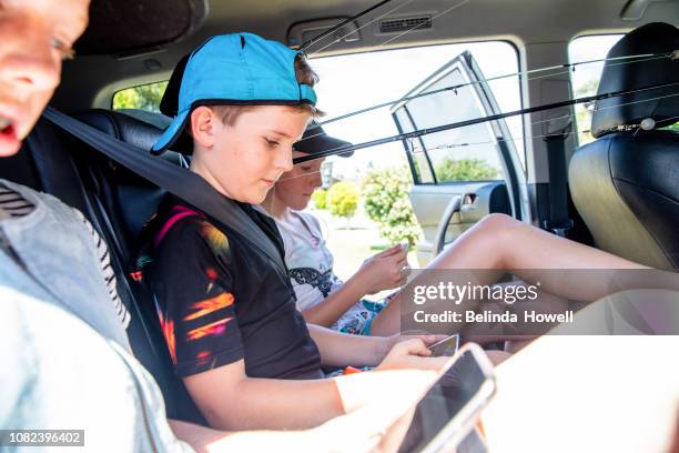 australian family spends the weekend with grandparents on a pontoon boat on the gold coast broadwater. - australian family car fotografías e imágenes de stock