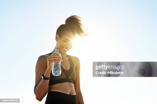 fit just feels so good - running refreshment stock pictures, royalty-free photos & images