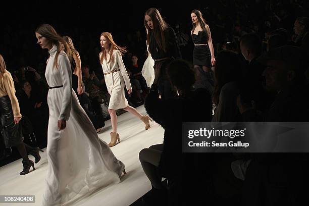 Models walk the runway at the Kaviar Gauche Show during the Mercedes Benz Fashion Week Autumn/Winter 2011 at Bebelplatz on January 21, 2011 in...