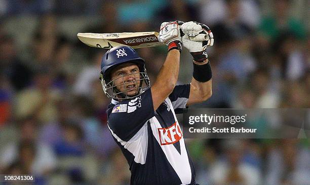 Brad Hodge of the Bushrangers hits a six during the Twenty20 Big Bash match between the Victorian Bushrangers and the New South Wales Blues at...