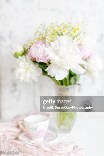 bouquet of fresh peonies and daisies - crystal glassware stock pictures, royalty-free photos & images