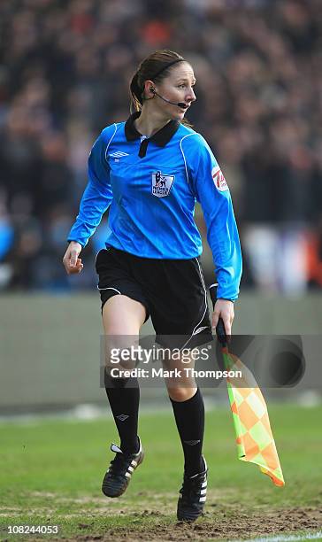 Female assistant referee Sian Massey in action during the Barclays Premier League match between Wolverhampton Wanderers and Liverpool at Molineux on...