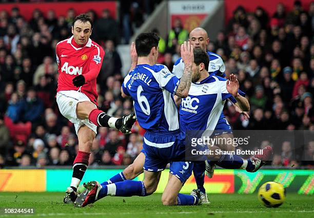 Dimitar Berbatov of Manchester United scores his team's second goal during the Barclays Premier League match between Manchester United and Birmingham...