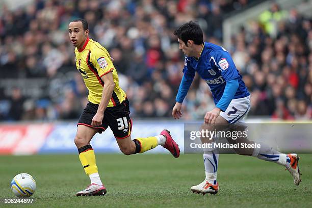 Andros Townsend is shadowed by Peter Whittingham during the npower Championship game between Cardiff City and Watford at Cardiff City stadium on...