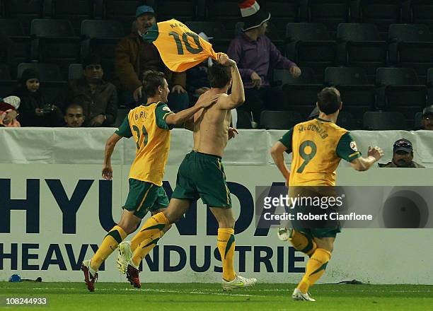 Harry Kewell of Australia celebrates his goal in extra time during the AFC Asian Cup quarter final match between the Australian Socceroos and Iraq at...