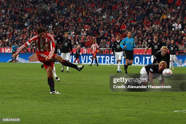 Mario Gomez of Muenchen scores his third team goal during the Bundesliga match between FC Bayern Muenchen and 1. FC Kaiserslautern at Allianz Arena...