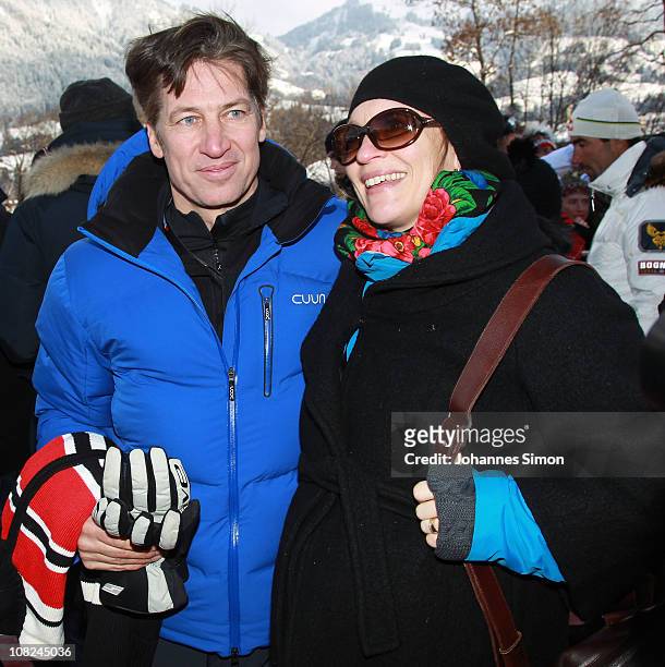 Italian Actor Tobias Moretti and his pregnant wife Julia attend the Hahnenkamm race on January 22, 2011 in Kitzbuehel, Austria.