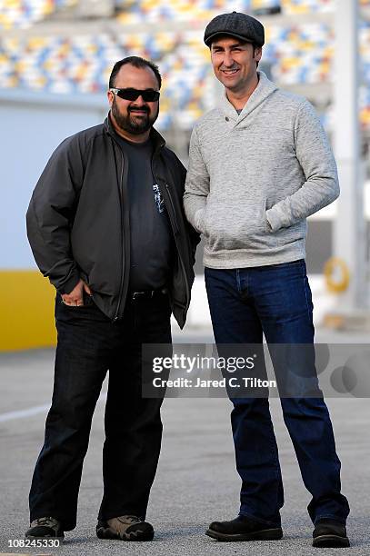 Frank Fritz and Mike Wolfe, hosts of the hit television series American Pickers, look on in the garage during testing at Daytona International...