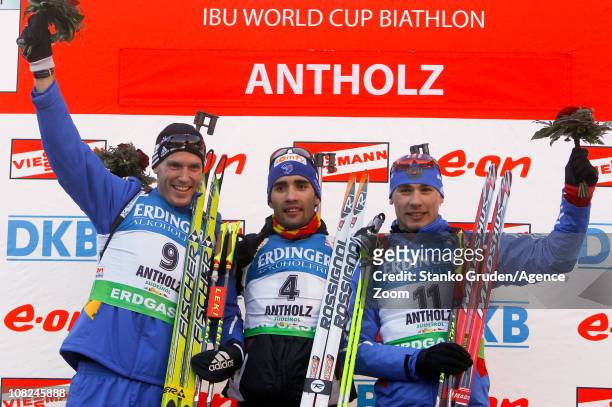 Bjorn Ferry of Sweden takes 2th place,Martin Fourcade of France takes 1st place, Anton Shipulin of Russia takes 3rd place during the IBU World Cup...