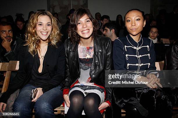 Alysson Paradis, Tamara Kaboutchek and Bao Bao Wan attend the John Galliano: Paris Fashion Week Menswear F/W 2011 show as part of Paris Menswear...