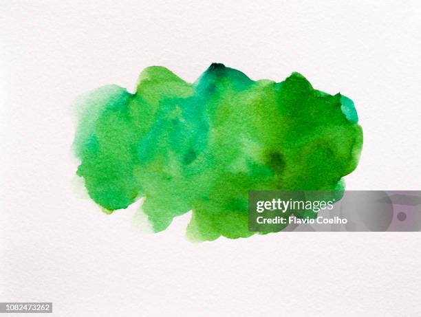 green watercolor brush strokes - acuarela fotografías e imágenes de stock
