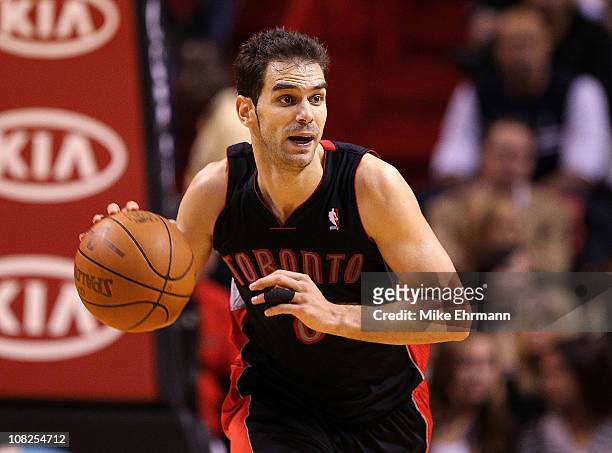 Jose Calderon of the Toronto Raptors dribbles the ball during a game against the Miami Heat at American Airlines Arena on January 22, 2011 in Miami,...