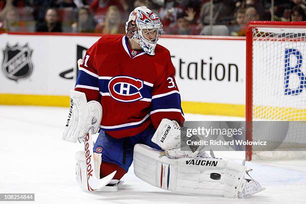 Carey Price of the Montreal Canadiens makes a pad save on the puck in overtime on a shot by Bobby Ryan of the Anaheim Ducks during the NHL game at...