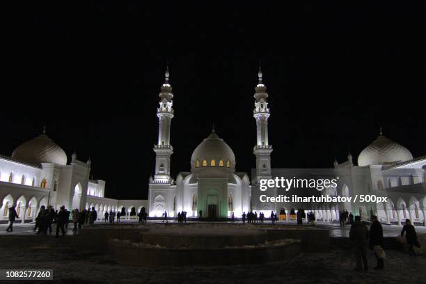 white mosque at bolgar. winter night - white mosque bolgar stock-fotos und bilder