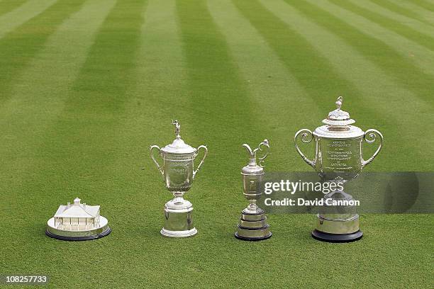 Unique collection of golf trophies The Masters player replica trophy won by Phil Mickelson of the USA in 2010, The US Open trophy won by Graeme...