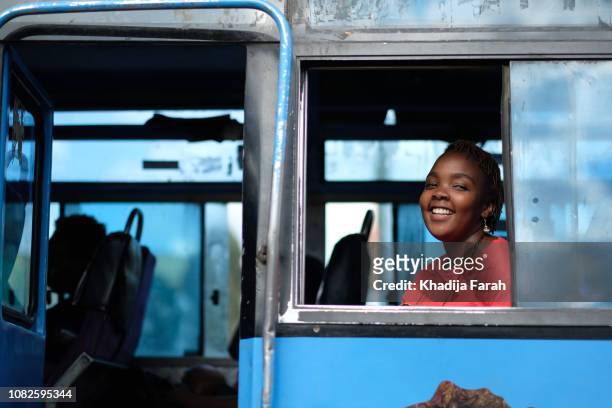 woman in public transport bus - nairobi city stock pictures, royalty-free photos & images