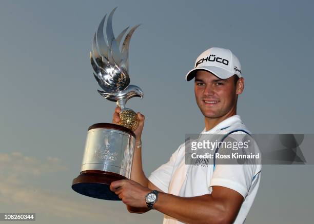 Martin Kaymer of Germany with the winners trophy after the final round of the Abu Dhabi HSBC Golf Championship at the Abu Dhabi Golf Club on January...
