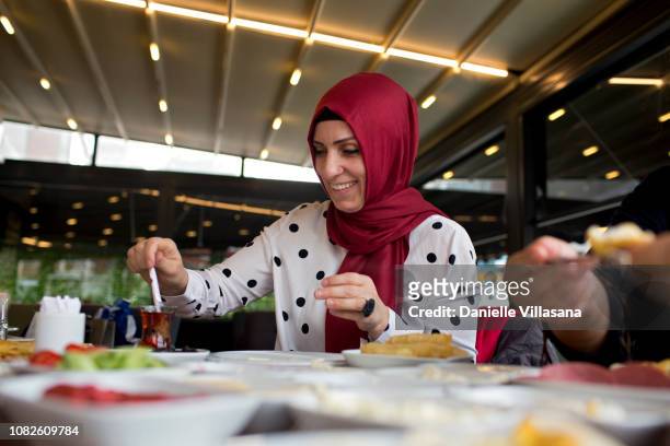 Turkish woman eating breakfast